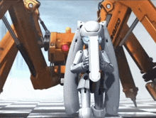 a robot is standing in front of a machine that says pulse on it
