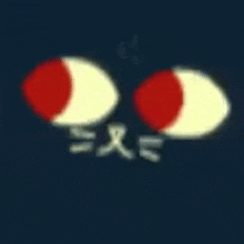 a close up of a cat 's eyes with a red and yellow crescent moon .