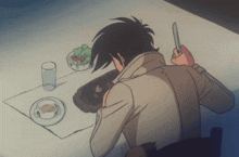 a man is sitting at a table with a knife and fork