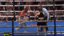 a boxing match is being shown on a screen that says taylor