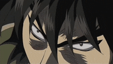 a close up of a cartoon character 's face with a white eye
