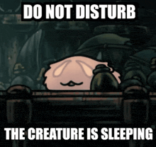 a cartoon character with a mustache is sleeping in a dark room with a do not disturb message .