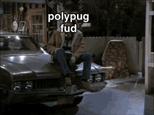 a man is sitting on the hood of a car with the words polypug fud written above him