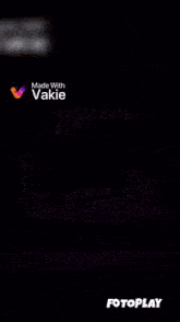 a blue bird with a yellow beak is on a screen made with vakie