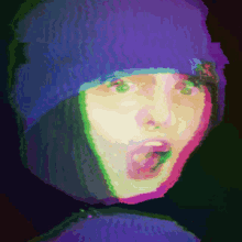 a pixel art of a person wearing a purple beanie