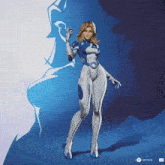 a woman in a blue and white suit is standing in front of a blue and white background