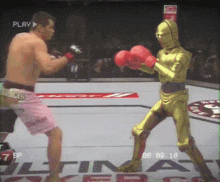 a video of a boxing match with a play button