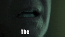 a close up of a person 's mouth with the words the beast above it