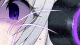 a close up of a person 's face with a purple circle around it