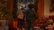 Looking At The Window A Boy Called Christmas GIF - Looking At The Window A Boy Called Christmas Looking Outside GIFs