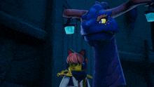 a girl standing next to a large blue dragon