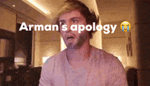 a man with a beard is making a funny face with the words arman 's apology written above him .