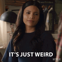 a woman says it 's just weird in front of a netflix logo