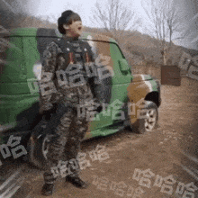 a man in military uniform stands in front of a green van