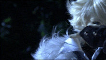 a close up of a person 's face with a white furry wig on
