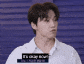 a man in a white shirt says it 's okay now in a foreign language