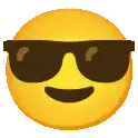 a smiley face wearing sunglasses is smiling .