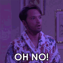 a man in a robe says oh no