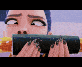 a woman with long black nails is eating a sushi roll