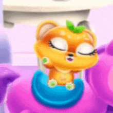 a cartoon cat with a green leaf on its head is sitting on a pink stuffed animal with its eyes closed .
