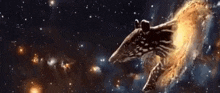 a tapir is flying through space in front of a spiral galaxy .