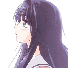 a girl with purple hair and blue eyes is smiling