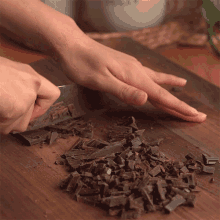 Cutting Chocolates Two Plaid Aprons GIF - Cutting Chocolates Two Plaid Aprons Chop It Off GIFs