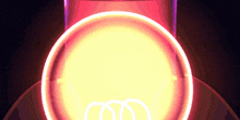 a glowing circle with the letter m in the middle of it
