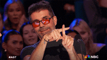 Making A Cross With My Fingers Simon Cowell GIF - Making A Cross With My Fingers Simon Cowell America'S Got Talent GIFs