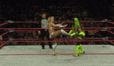 two women wrestle in a ring with the word impact on the side