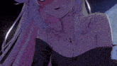 a close up of a girl 's neck and chest with a flower on it