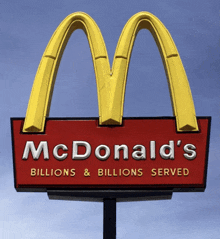 a red and yellow mcdonald 's sign that says billions and billions served