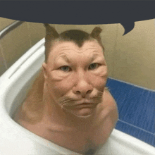 a man in a bathtub with a cat 's face on his face