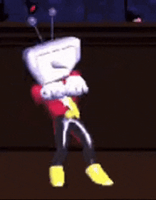 a cartoon character with a head that looks like a tv is dancing in a dark room .
