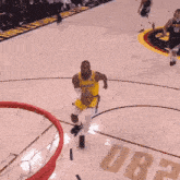 a basketball player with the number 6 on his jersey is dunking a basketball