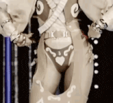 a close up of a woman 's torso and legs in a costume with hearts on it .