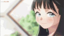 a close up of a girl 's face with the words timeflv.net visible