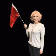 Wave The Red Flag Red Flag GIF - Wave The Red Flag Red Flag Smiling GIFs