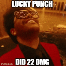 a man wearing sunglasses and a red suit with the words lucky punch did 22 dmg on it