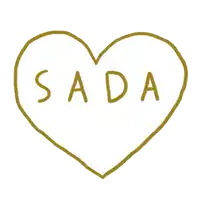a gold heart with sada ladies written on it