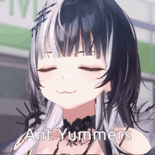 a close up of a girl with the words ant yummers written on her face