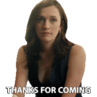 a woman says " thanks for coming " while sitting down