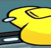 a yellow cartoon character is laying down on a table with a knife in its mouth .