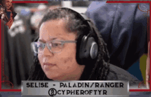a woman wearing headphones with the name selise written on the bottom