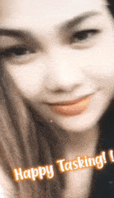 a close up of a woman 's face and the words happy tasking