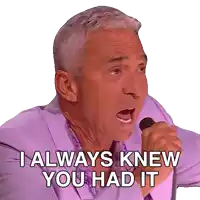 a man singing into a microphone with the words i always knew you had it