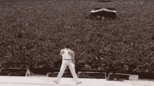 Freddie Mercury Live Aid Yes GIF - Freddie Mercury Live Aid Yes Concert GIFs