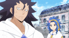 a man and a girl are standing in front of a building and the girl has a flower on her head