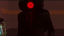 a person 's head is visible in a dark room with a light coming out of it