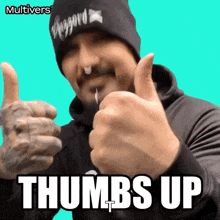 a man is giving a thumbs up with the words " thumbs up " behind him